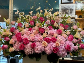 
                  
                    Pink floral arrangement 
                  
                